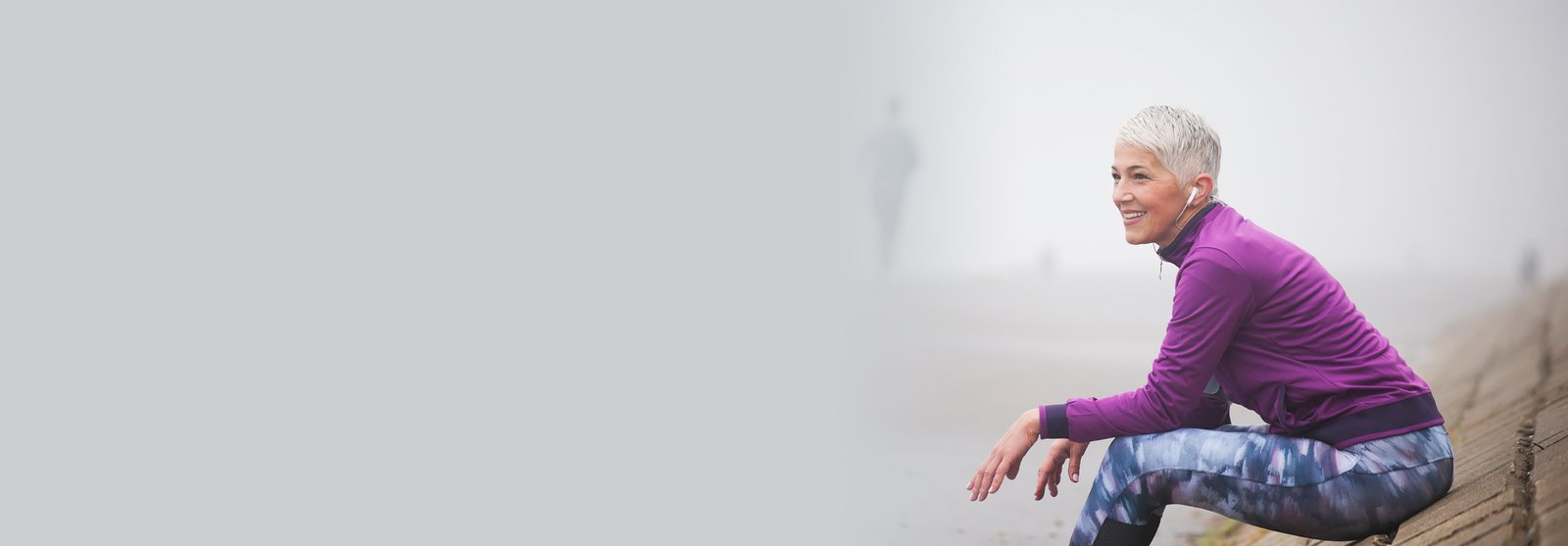 Woman sitting and resting while out on a walk