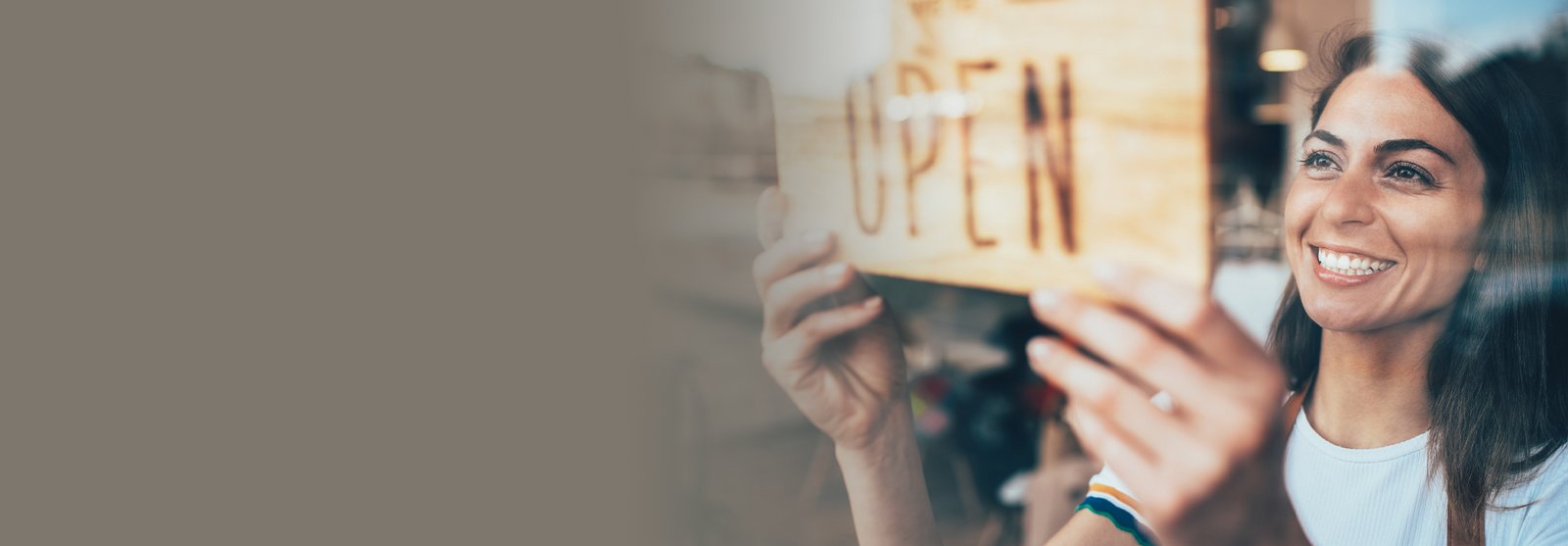 woman with an open sign