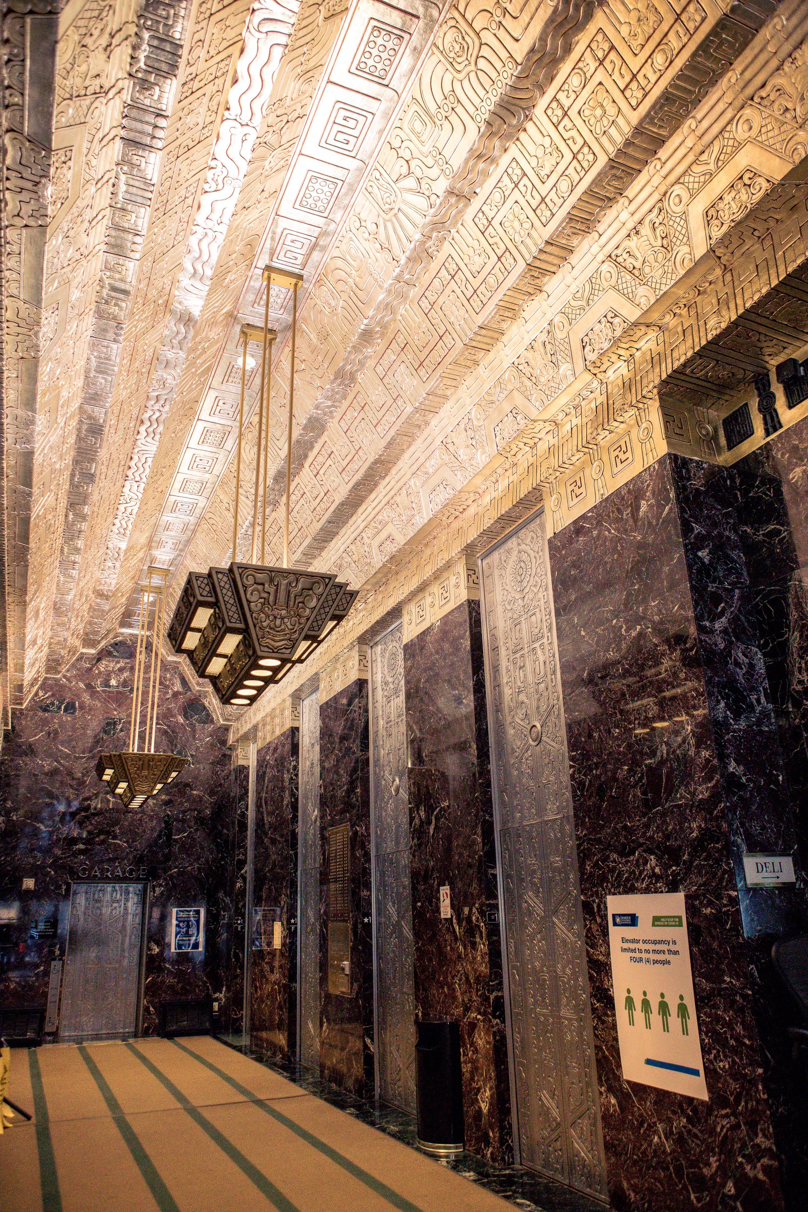 hallway with elevators